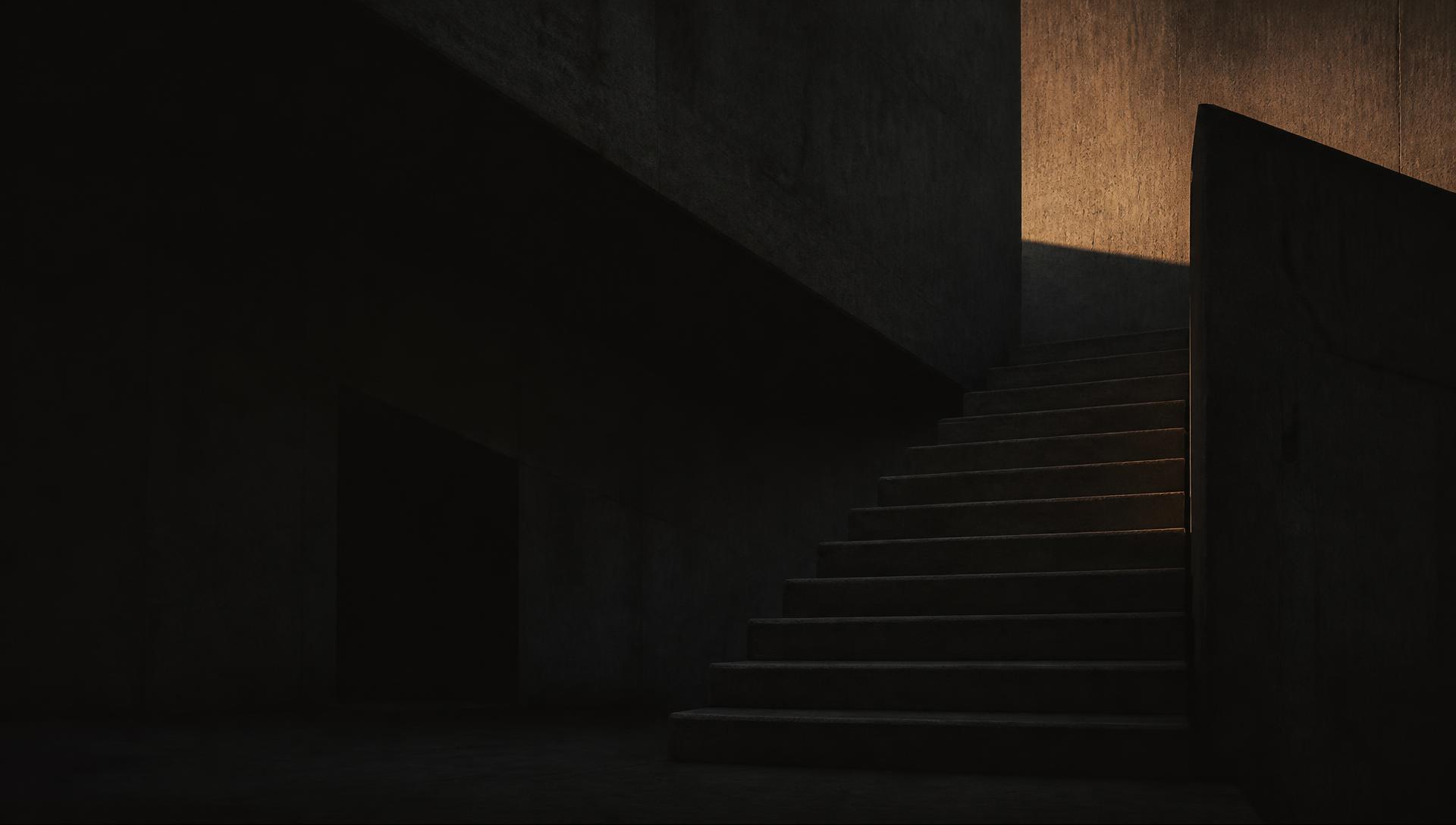 Low-light architectural staircase with geometric shadow